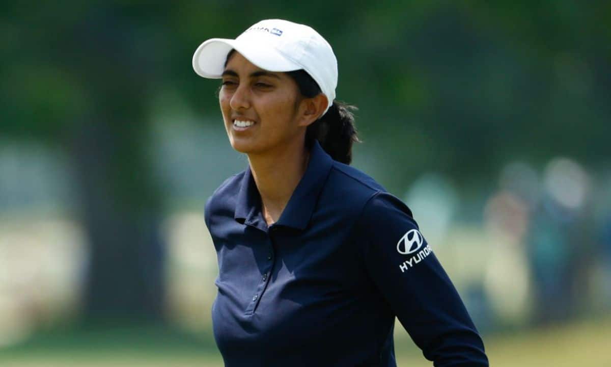 Aditi Ashok of India reacts to a putt on the ninth green