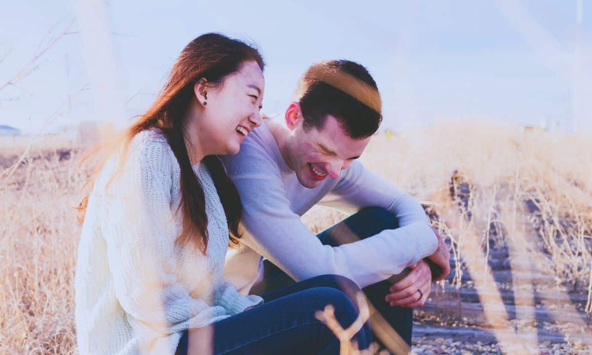 couple laughing happily together